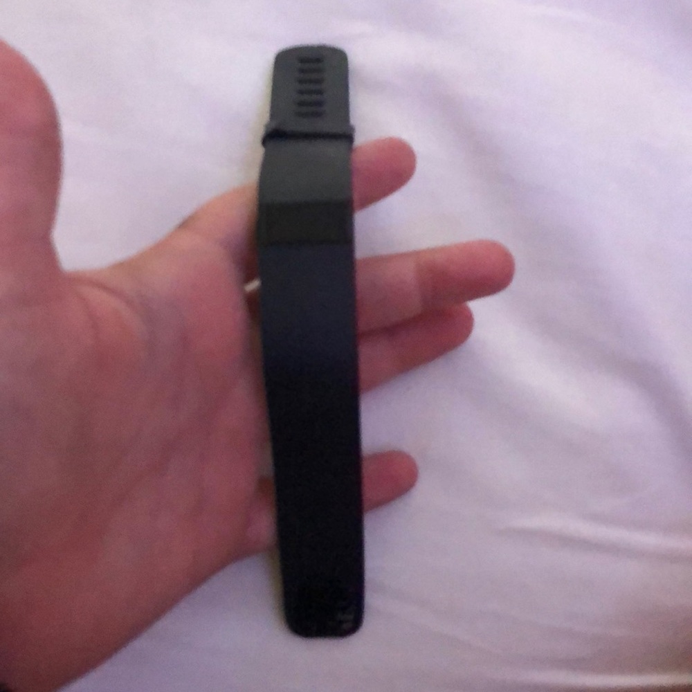 Black Fitbit.